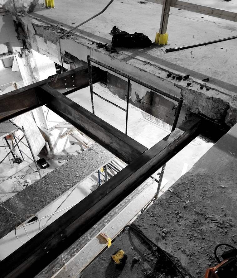 New steel framing a floor opening