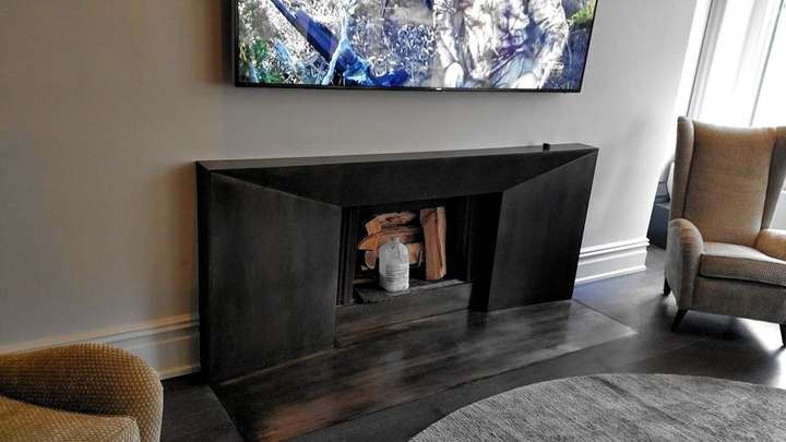 Blackened steel fireplace surround
