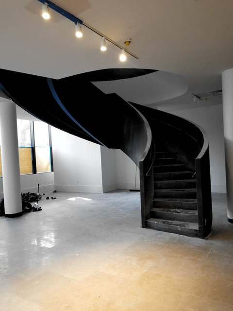 Freestanding blackened plate helical stair