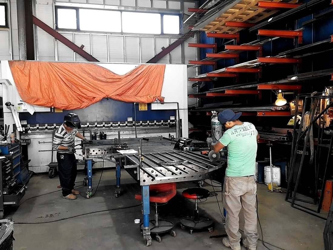 Press brake and fit-up table in the shop